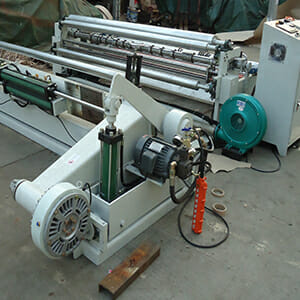 Jumbo roll slitting & rewinding machine