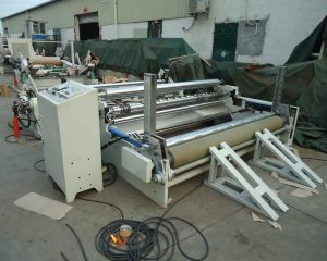 Jumbo roll slitting & rewinding machine