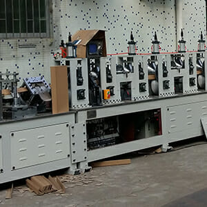 Paper edge protector making machine